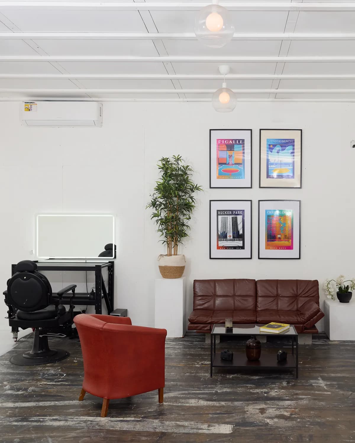 The lounge end of the H86 studio floor, with seating and the make-up station